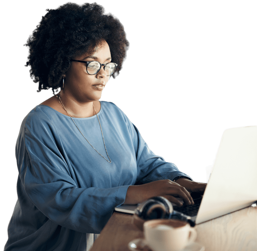 woman on a laptop at a cafe accessing corporate network